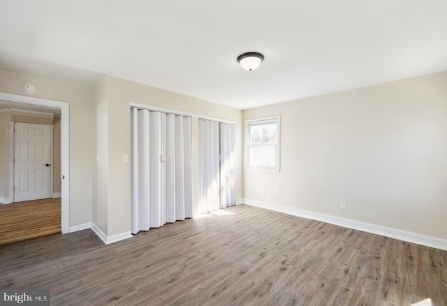 909 Spruce Ave, Pleasantville, NJ 08232 - unfurnished bedroom with baseboards, wood finished floors, and a closet