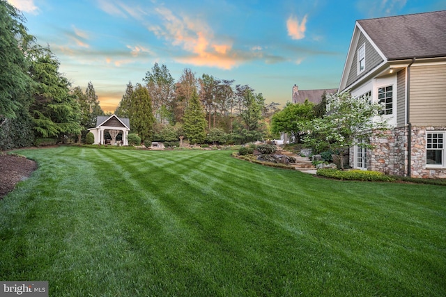 11820 Plantation Dr, Great Falls, VA 22066 - yard at dusk with a gazebo