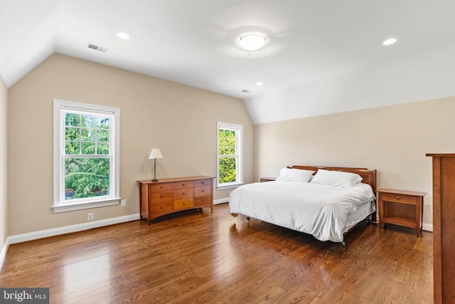 11820 Plantation Dr, Great Falls, VA 22066 - bedroom with baseboards, vaulted ceiling, wood finished floors, and visible vents