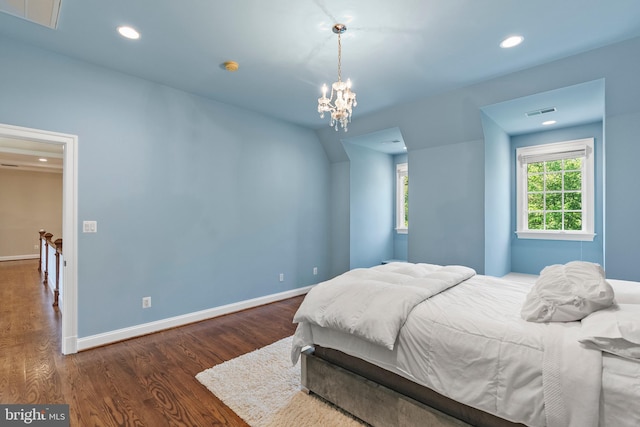 11820 Plantation Dr, Great Falls, VA 22066 - bedroom with visible vents, wood finished floors, baseboards, a notable chandelier, and recessed lighting