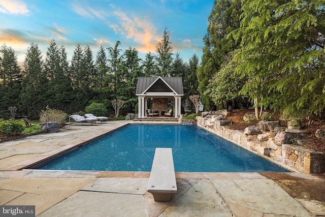 11820 Plantation Dr, Great Falls, VA 22066 - pool featuring a gazebo, a diving board, and a patio area