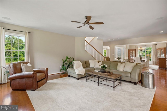 12670 Perrywood Ln, Dunkirk, MD 20754 - living area with plenty of natural light, wood finished floors, a chandelier, and recessed lighting