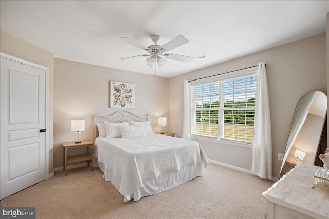 12670 Perrywood Ln, Dunkirk, MD 20754 - bedroom featuring baseboards, light colored carpet, and ceiling fan
