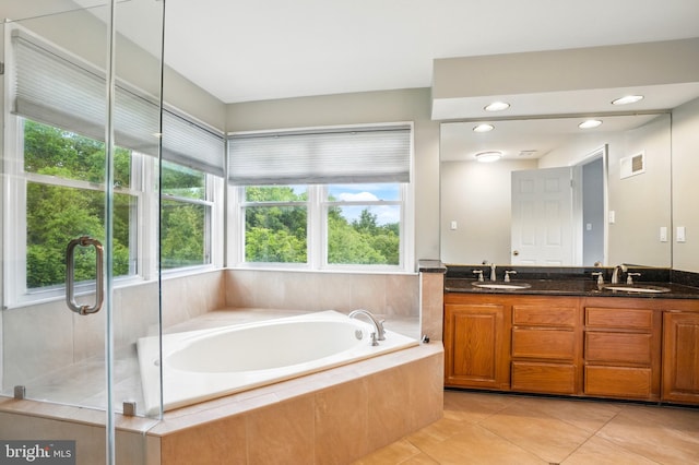 6759 Bronze Post Rd, Centreville, VA 20121 - full bathroom with a bath, tile patterned flooring, and double vanity