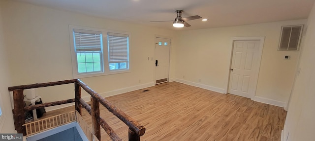 2920 Dares Beach Rd, Prince Frederick, MD 20678 - empty room featuring light wood-style flooring, ceiling fan, baseboards, and recessed lighting