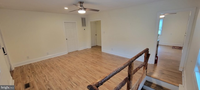 2920 Dares Beach Rd, Prince Frederick, MD 20678 - unfurnished bedroom featuring light wood-style flooring, baseboards, a ceiling fan, and recessed lighting