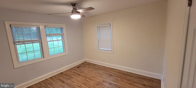 2920 Dares Beach Rd, Prince Frederick, MD 20678 - spare room with baseboards, wood finished floors, and ceiling fan