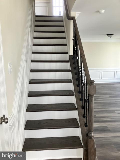 111 Heulings Ave, Riverside, NJ 08075 - stairs with wood finished floors and ornamental molding