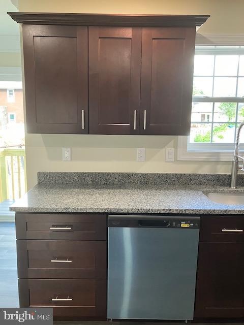 111 Heulings Ave, Riverside, NJ 08075 - kitchen with dishwasher, a sink, and dark brown cabinetry