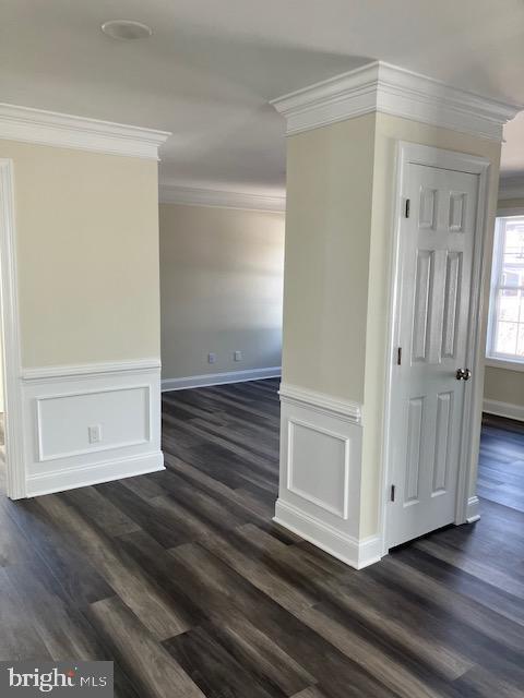 111 Heulings Ave, Riverside, NJ 08075 - unfurnished room featuring ornamental molding, dark wood-style floors, a wainscoted wall, and baseboards