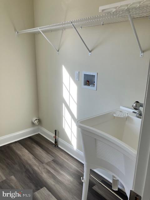 111 Heulings Ave, Riverside, NJ 08075 - washroom with washer hookup, baseboards, and wood finished floors