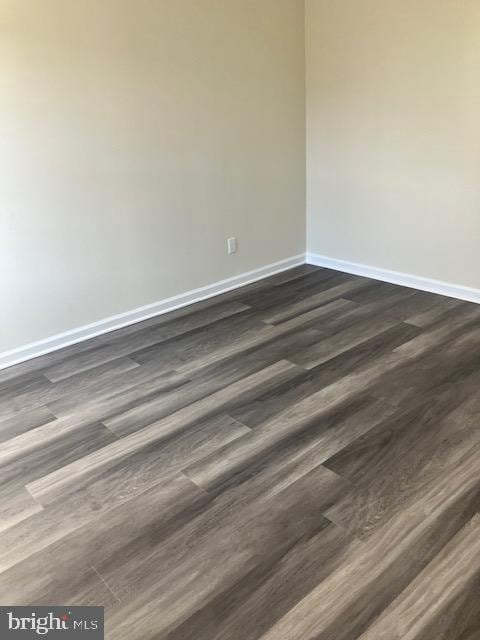 111 Heulings Ave, Riverside, NJ 08075 - unfurnished room with baseboards and dark wood-style floors