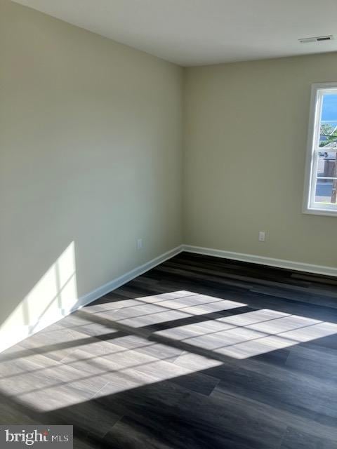 111 Heulings Ave, Riverside, NJ 08075 - spare room featuring baseboards and wood finished floors