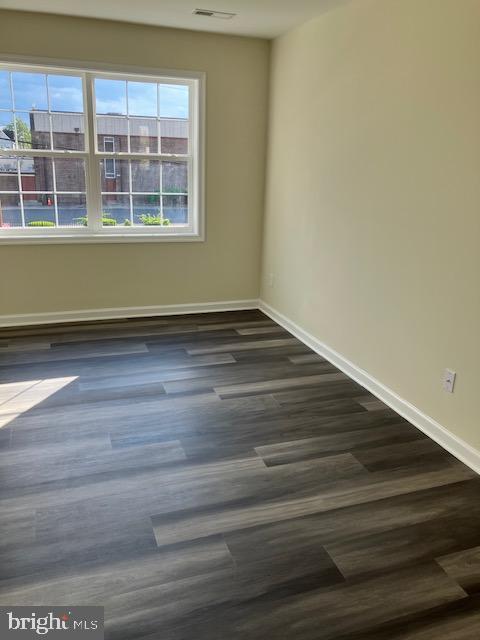 111 Heulings Ave, Riverside, NJ 08075 - spare room with baseboards and wood finished floors