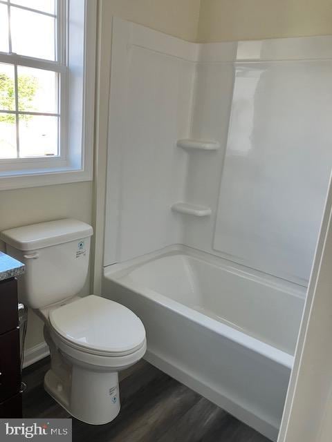 111 Heulings Ave, Riverside, NJ 08075 - full bathroom featuring vanity, toilet, wood finished floors, and  shower combination