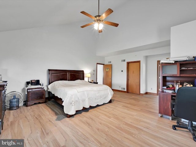 bedroom featuring high vaulted ceiling, ceiling fan, baseboards, and wood finished floors