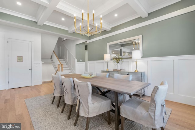 dining area featuring coffered ceiling, stairs, an inviting chandelier, beam ceiling, and light wood-style floors