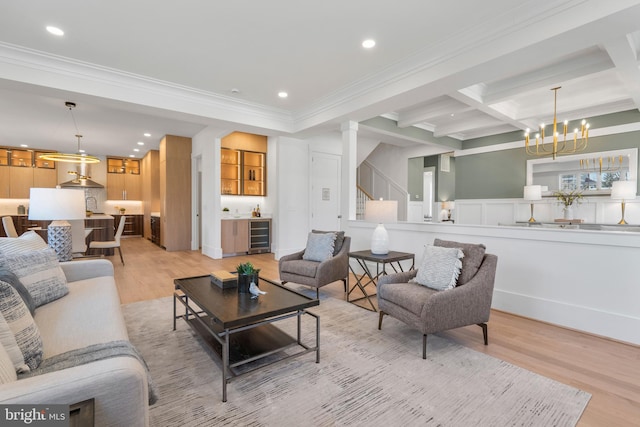 living area with beamed ceiling, recessed lighting, light wood-style floors, and wine cooler