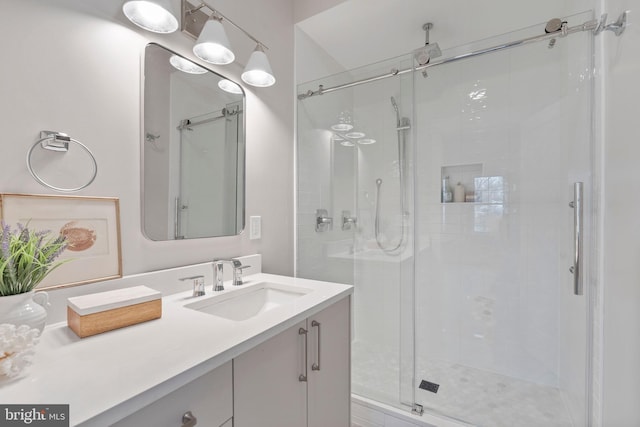 full bathroom featuring vanity and a stall shower