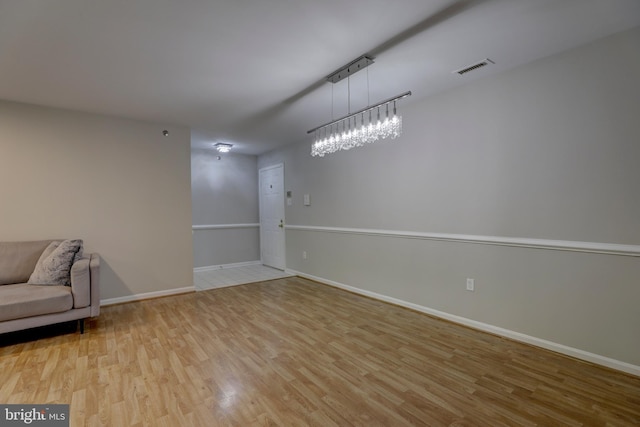 2 Rainflower Path Unit 102, Sparks Glencoe, MD 21152 - unfurnished room with wood finished floors and baseboards