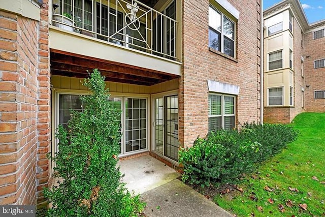 2 Rainflower Path Unit 102, Sparks Glencoe, MD 21152 - property entrance with brick siding and a balcony