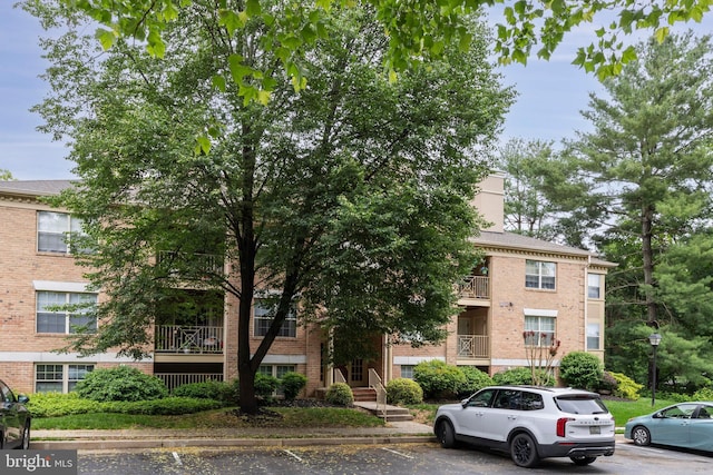 2 Rainflower Path Unit 102, Sparks Glencoe, MD 21152 - view of building exterior featuring uncovered parking