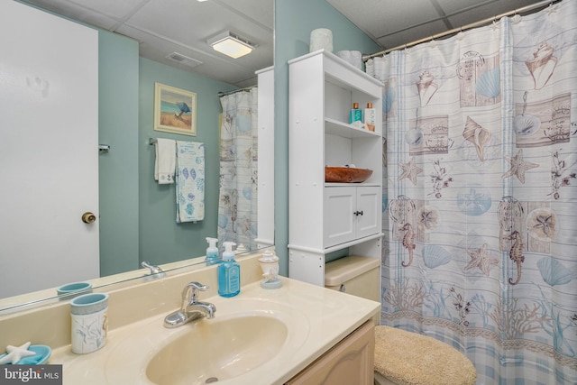 107 Convention Center Dr Unit 161D, Ocean City, MD 21842 - full bath featuring toilet, curtained shower, vanity, visible vents, and a paneled ceiling