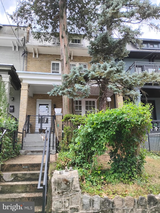 view of front of property with brick siding