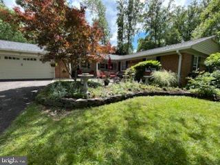 3004 Bluff Point Ln, Silver Spring, MD 20906 - single story home featuring asphalt driveway, a front lawn, and a garage