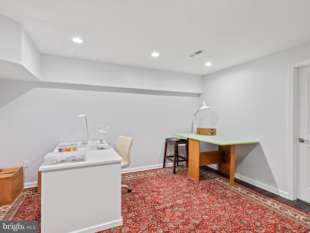 home office featuring wood finished floors, visible vents, baseboards, and recessed lighting