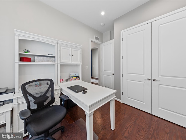 office space with dark wood-type flooring, visible vents, and recessed lighting