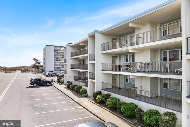 11 131st St Unit 211N, Ocean City, MD 21842 - view of building exterior featuring uncovered parking