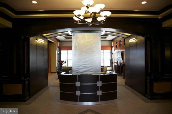 1144 Halifax Pl, Hamilton, NJ 08619 - welcome area with a notable chandelier and arched walkways