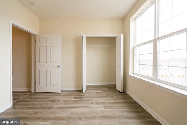 1144 Halifax Pl, Hamilton, NJ 08619 - unfurnished bedroom with a closet, baseboards, and light wood-type flooring