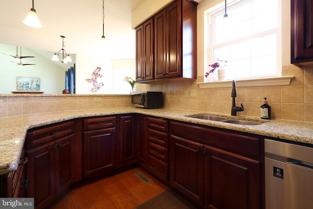 311 Treetops Dr, State College, PA 16801 - kitchen featuring visible vents, decorative light fixtures, a sink, black microwave, and backsplash