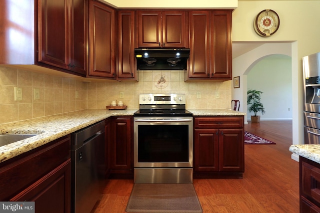 311 Treetops Dr, State College, PA 16801 - kitchen featuring stainless steel appliances, under cabinet range hood, and dark brown cabinets
