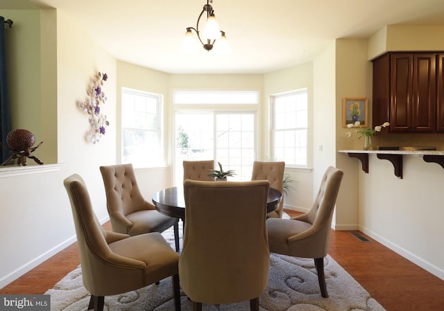 311 Treetops Dr, State College, PA 16801 - dining room featuring visible vents, baseboards, and wood finished floors