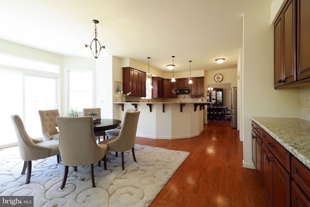 311 Treetops Dr, State College, PA 16801 - dining space featuring baseboards and dark wood-style floors