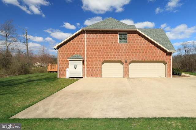 311 Treetops Dr, State College, PA 16801 - view of property exterior with roof with shingles, driveway, an attached garage, brick siding, and a yard