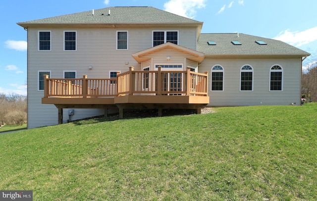 311 Treetops Dr, State College, PA 16801 - back of house with a yard, a shingled roof, and a deck