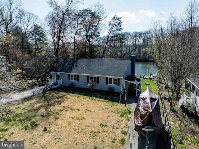 993 Hillendale Dr, Annapolis, MD 21409 - single story home with a water view, fence, roof with shingles, and a front lawn