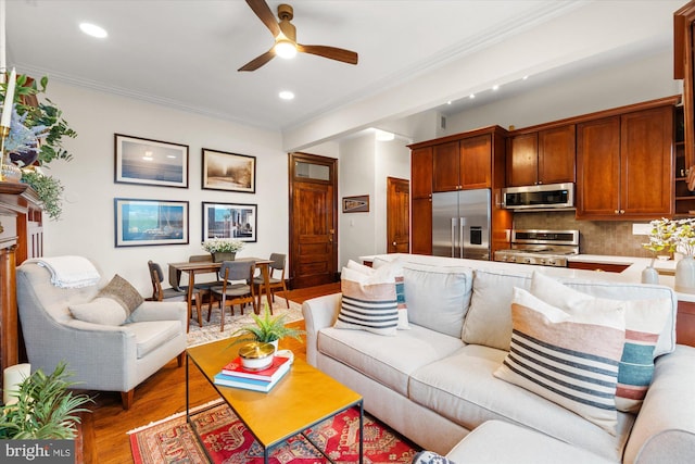2853 Ontario Rd NW Unit 609, Washington, DC 20009 - living room featuring ceiling fan, wood finished floors, crown molding, and recessed lighting