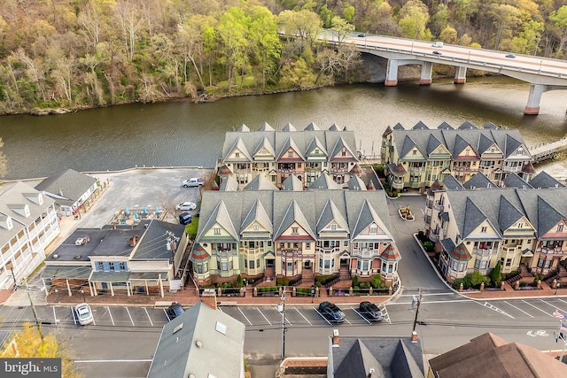 aerial view featuring a residential view and a water view
