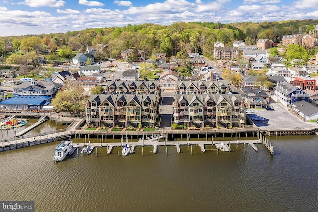 drone / aerial view with a water view
