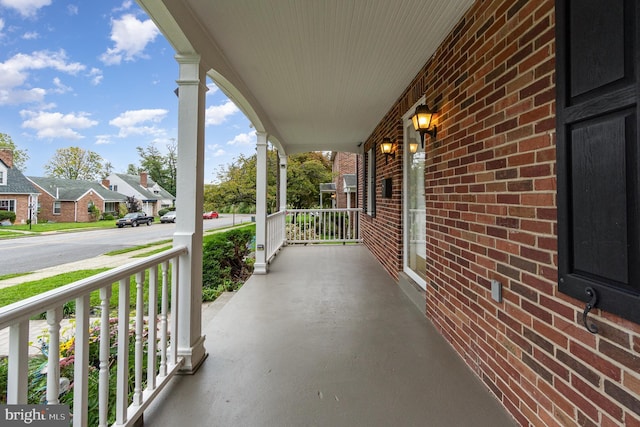 view of patio with a porch and a residential view