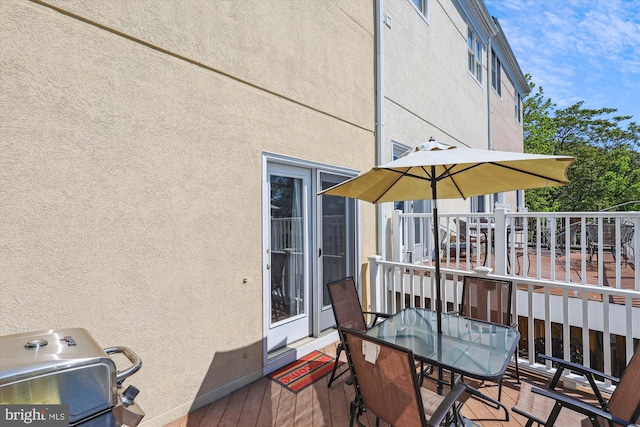 3814 Woodlawn Ct, Alexandria, VA 22304 - wooden terrace with outdoor dining area and a grill