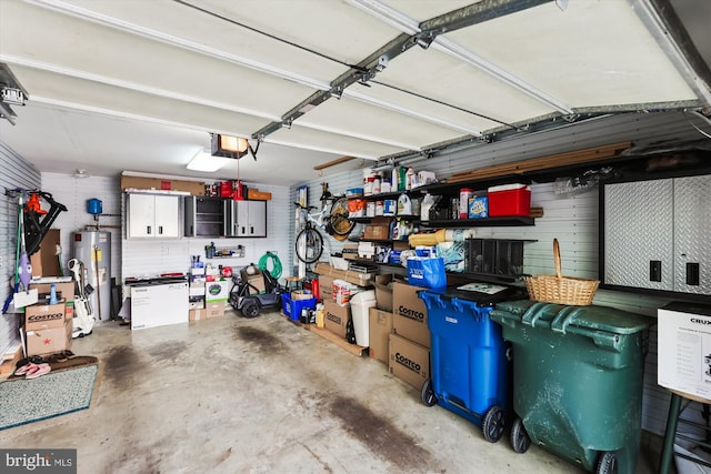3814 Woodlawn Ct, Alexandria, VA 22304 - garage with a garage door opener and water heater