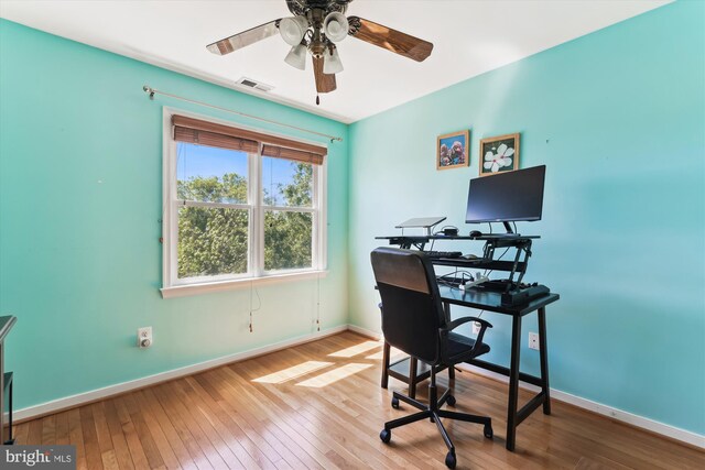 3814 Woodlawn Ct, Alexandria, VA 22304 - home office with wood-type flooring, a ceiling fan, and visible vents