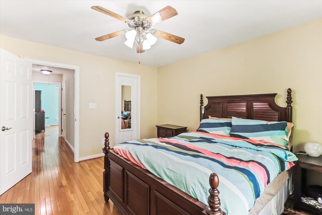 3814 Woodlawn Ct, Alexandria, VA 22304 - bedroom with baseboards, a ceiling fan, and light wood-type flooring