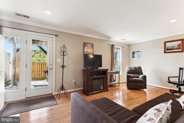 3814 Woodlawn Ct, Alexandria, VA 22304 - living area with recessed lighting, ornamental molding, light wood finished floors, and visible vents